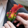 putting on a boutonniere
